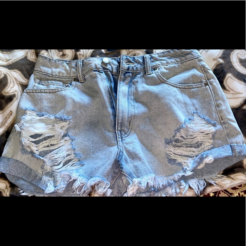 NWT - Light denim distressed shorts- Never been worn- Super cute for the summer!